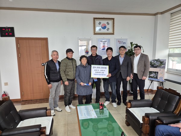 석문면 이장단 협의회, 주택 화재피해 2가구에 성금전달